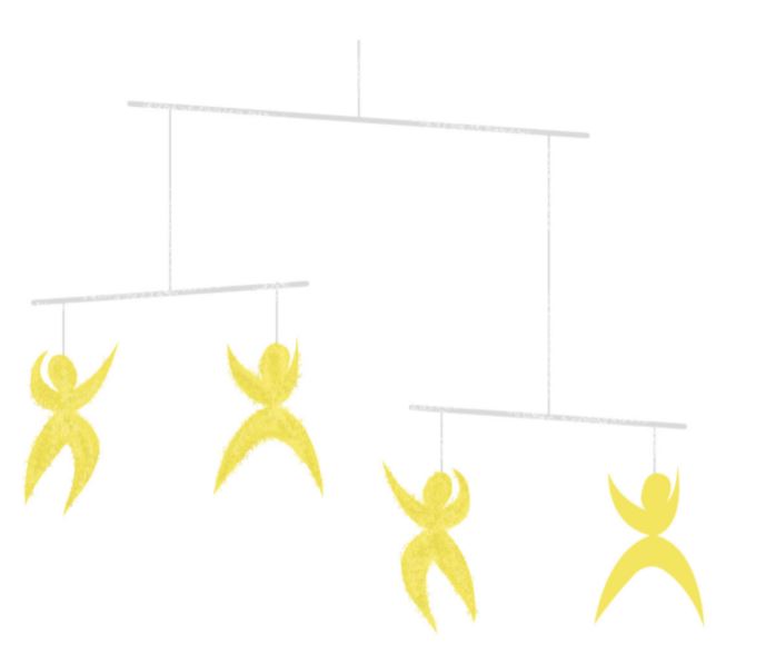 Montessori mobile hanging above a baby on a floor mat